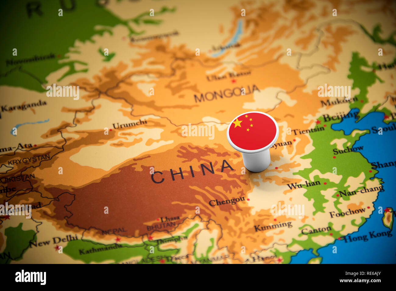 China marked with a flag on the map Stock Photo