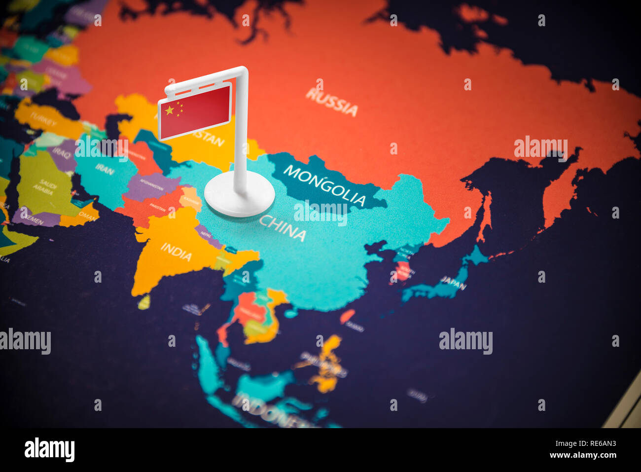 China marked with a flag on the map Stock Photo