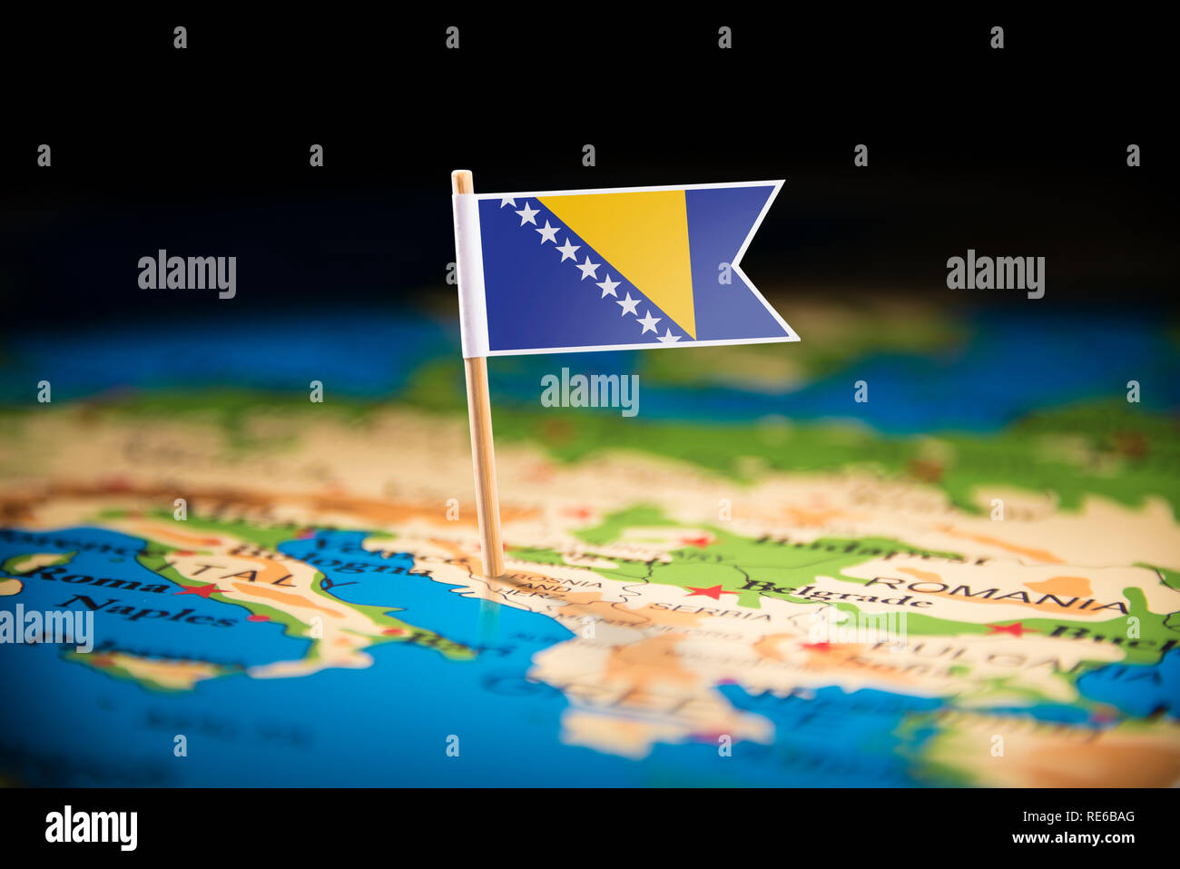 Bosnia and Herzegovina marked with a flag on the map Stock Photo
