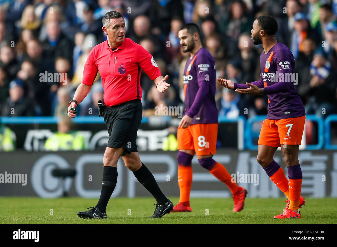 Huddersfield, UK. 20th Jan, 2019.  Editorial use only, license required for commercial use. No use in betting, games or a single club/league/player publications.Raheem Sterling of Manchester City argues with referee Andre Marriner after he is tackled in the penalty area during the Premier League match between Huddersfield Town and Manchester City at John Smith's Stadium on January 20th 2019 in Huddersfield, England. (Photo by Daniel Chesterton/phcimages.com) Credit: PHC Images/Alamy Live News Stock Photo