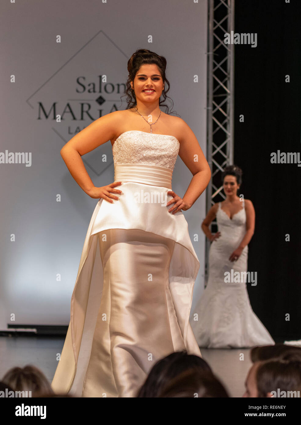 Lausanne, Switzerland. 20th Jan, 2019. Model wearing the new wedding solemn wedding dress collection 2019 at the Baulieu Expo in Lausanne, in Switzerland. Lausanne, Switzerland on the 20 th January, 2019. Credit: Eric Dubost/Alamy Live News. Stock Photo