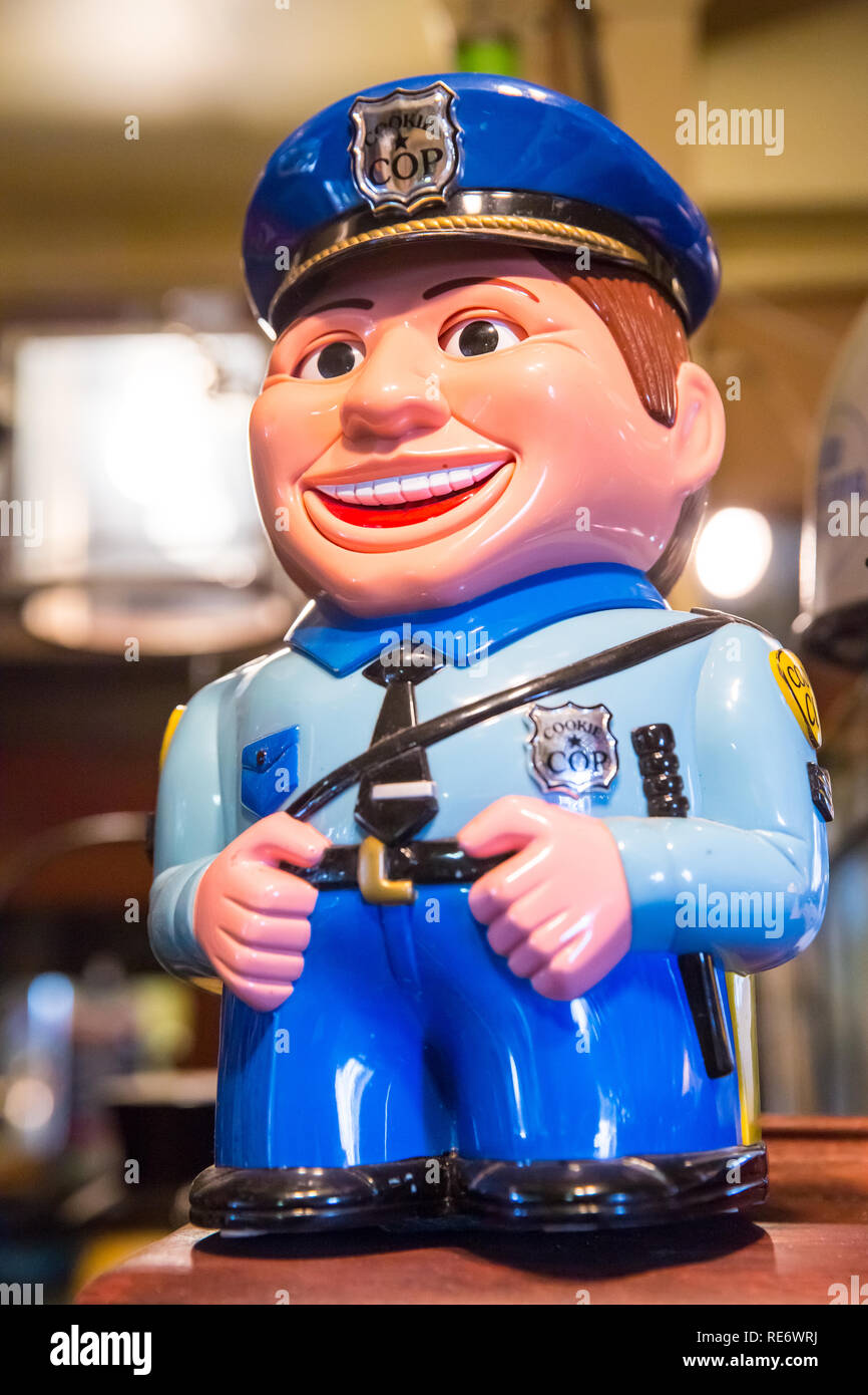 Quebec Province, Canada - 25th January 2015: A novelty retro Cookie Cop cookie jar for sale in a flea market. The officer says  Stop, Move away from t Stock Photo