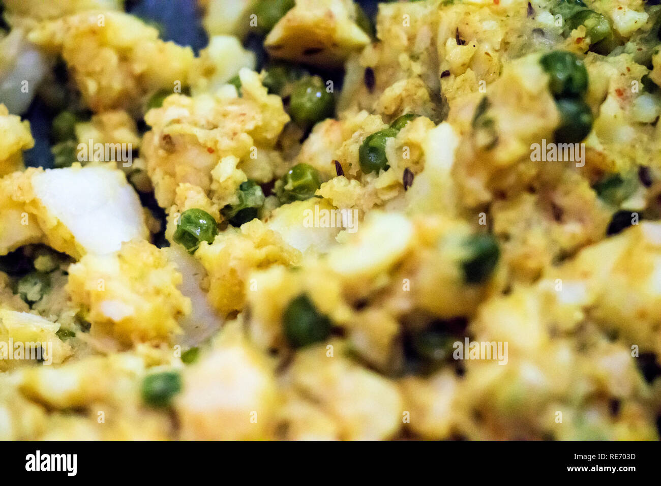 Spicy fried potatoes stuffing with peas and spices for samosa Stock