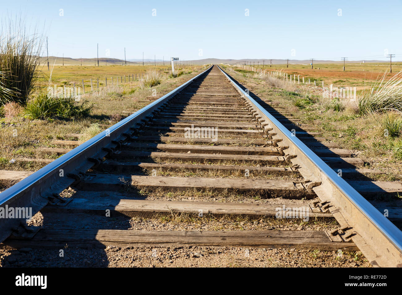 Transmongol Railway, single-track railway in steppe Mongolia Stock Photo