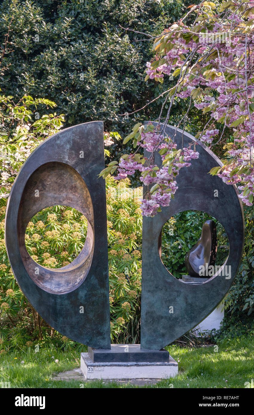 The Barbara Hepworth Museum and Sculpture Garden, St Ives, Cornwall, UK. Two Forms (Divided Circle), 1969, bronze Stock Photo