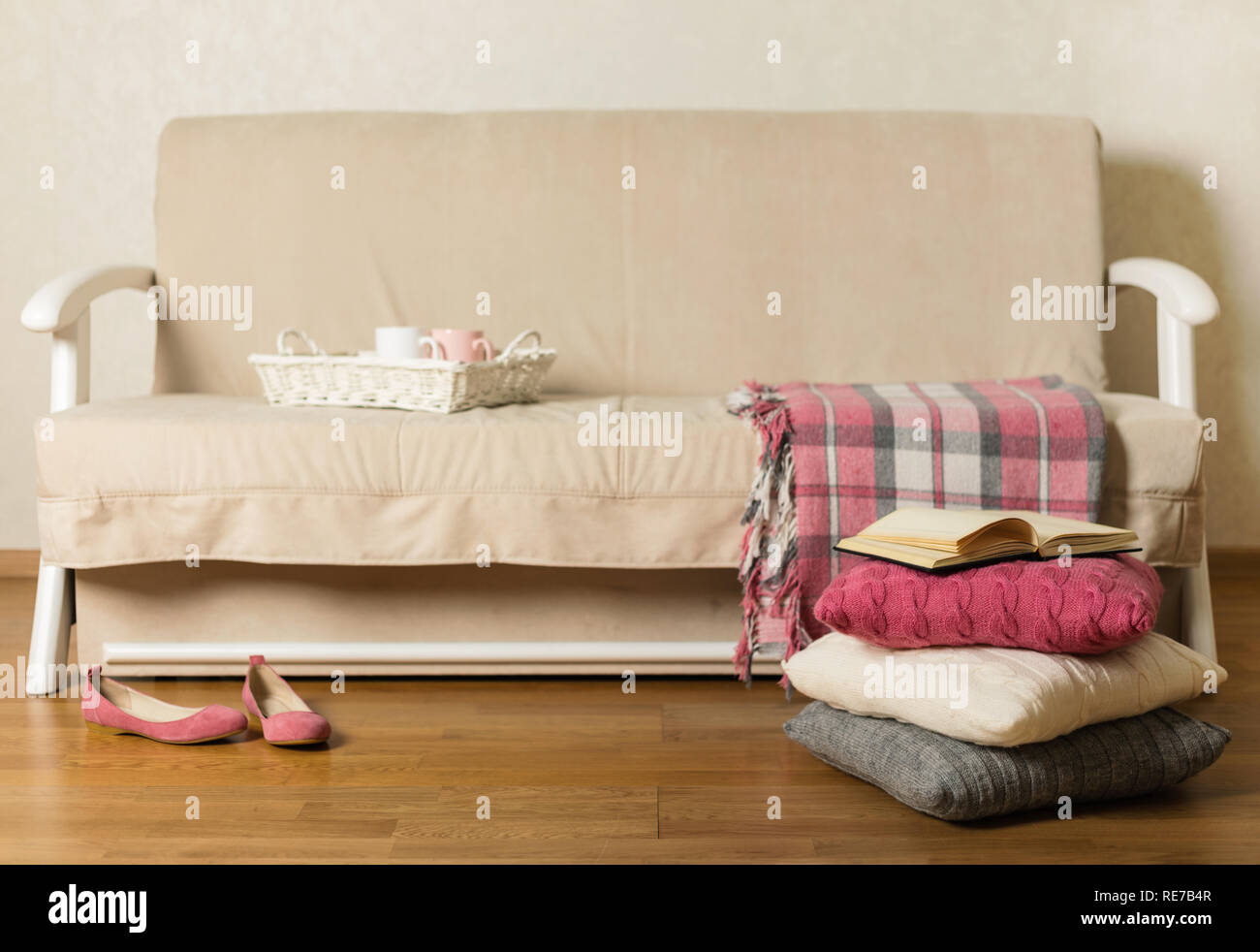 Beige Sofa With Plaid And Colorful Pillows Pink Grey