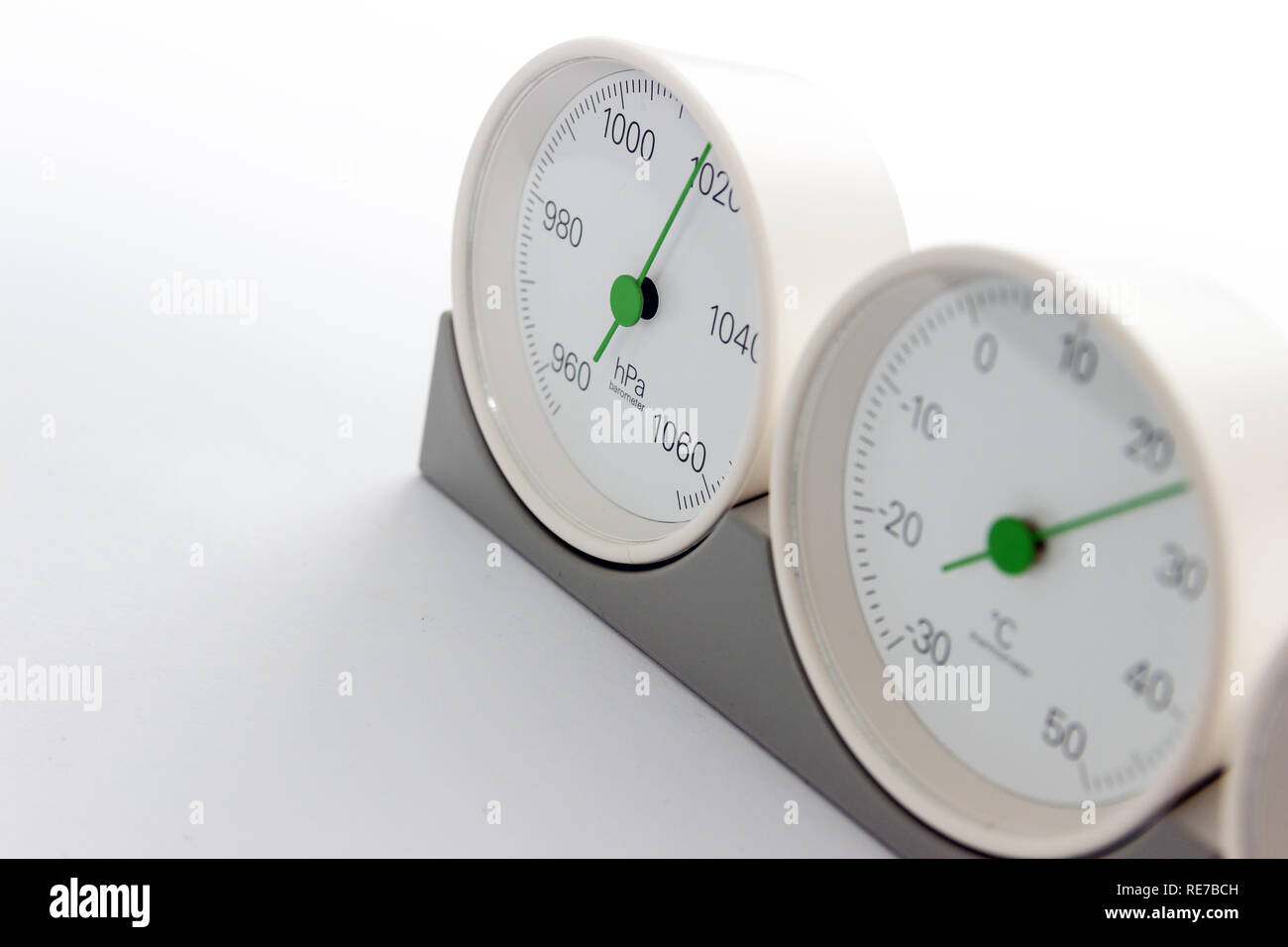 modern, round barometer, thermometer, hygrometer. Analog device for