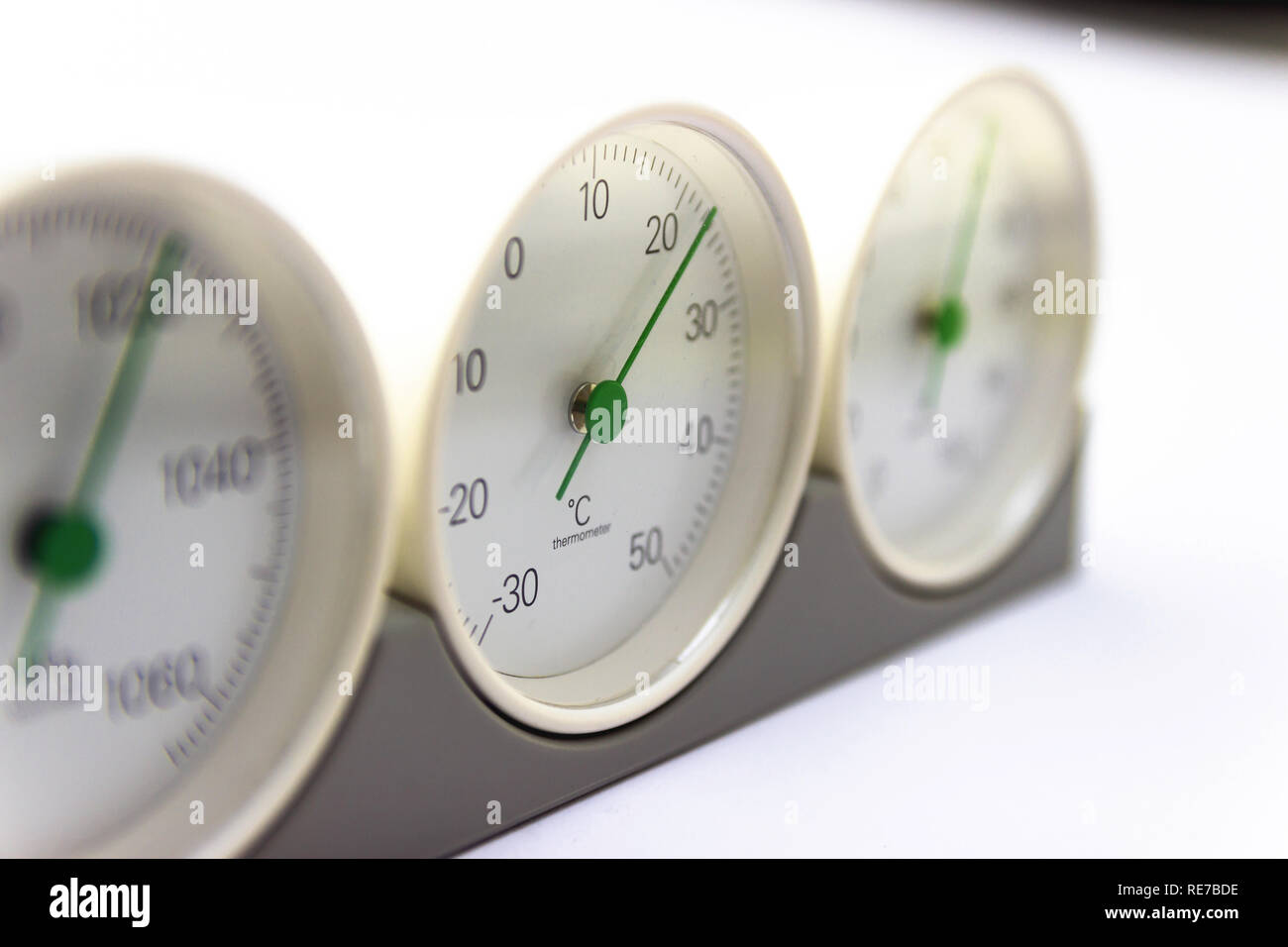 modern, round barometer, thermometer, hygrometer. Analog device for measuring humidity