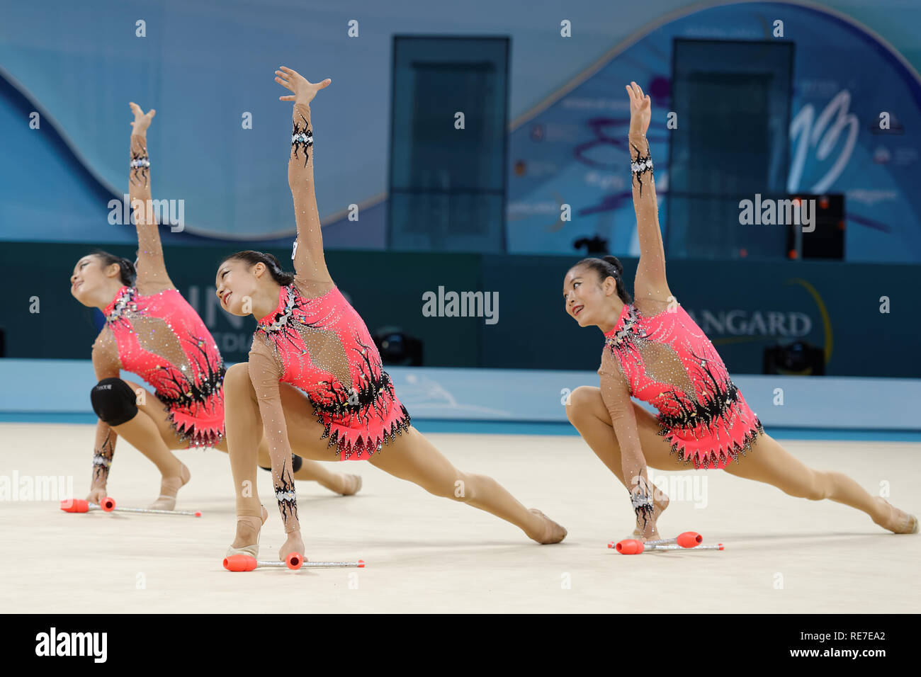 Kiev, Ukraine - August 31, 2013: Team Korea performs with clubs during 32nd Rhythmic Gymnastics World Championships. The event is held in the Palace o Stock Photo