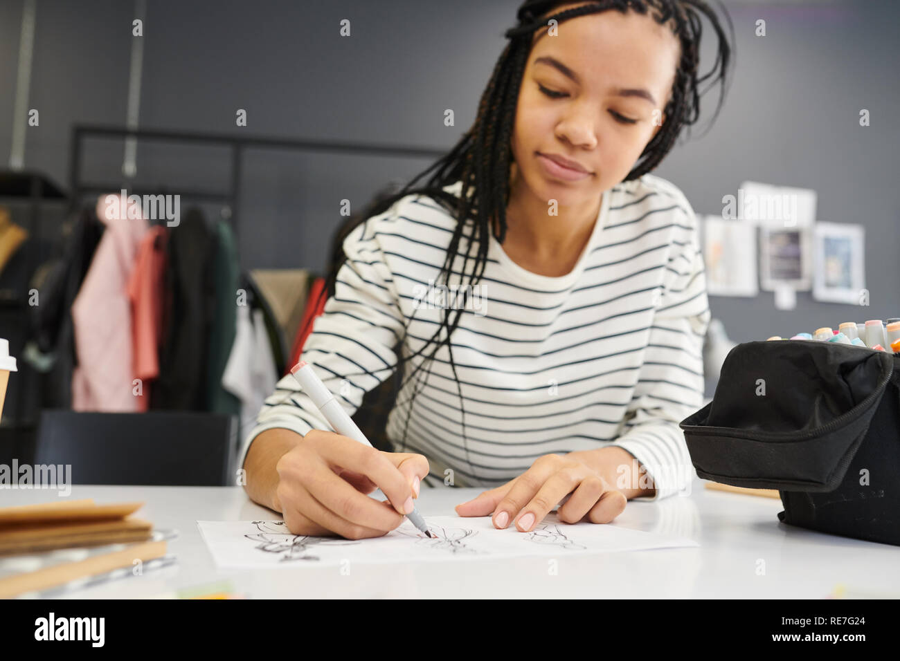 Female clothing designer drawing sketches hi-res stock photography and ...