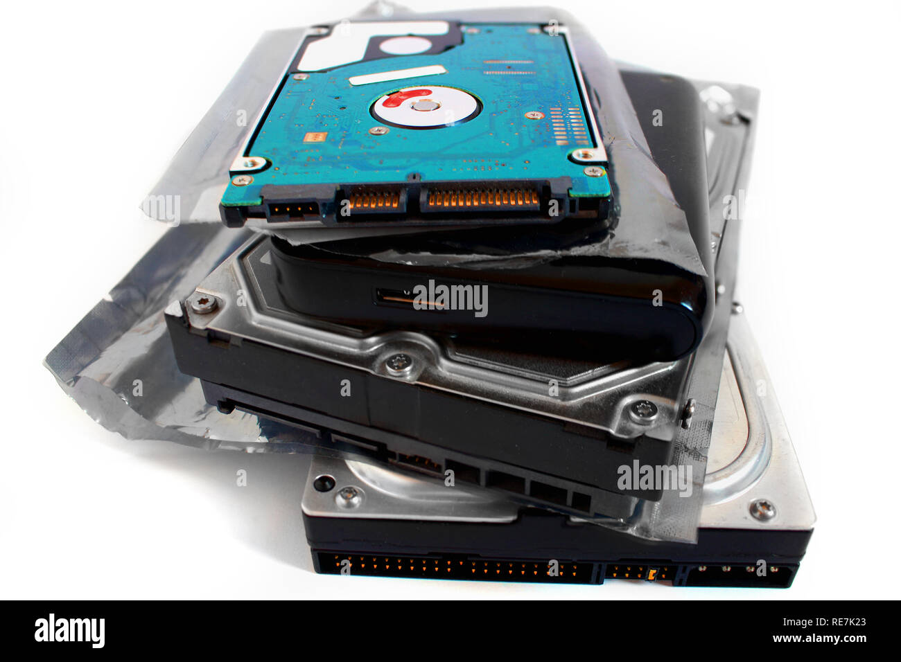 Pile of hard discs, 3.5 hdd, 2.5hdd, external hdd, anti static bag Stock Photo