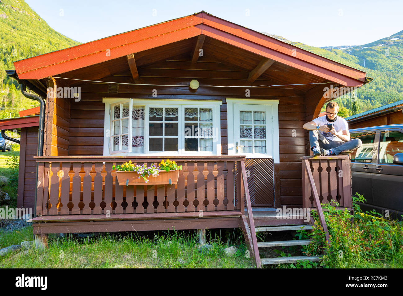 Stryn Norway 26 06 2018 Man In Red Camping Cabins For