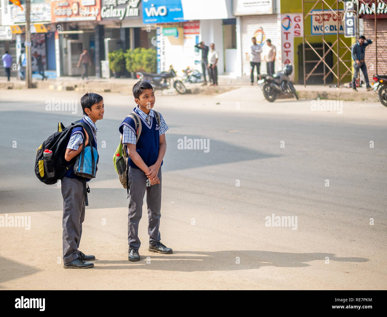 Child carrying heavy school bag hi-res stock photography and images - Alamy