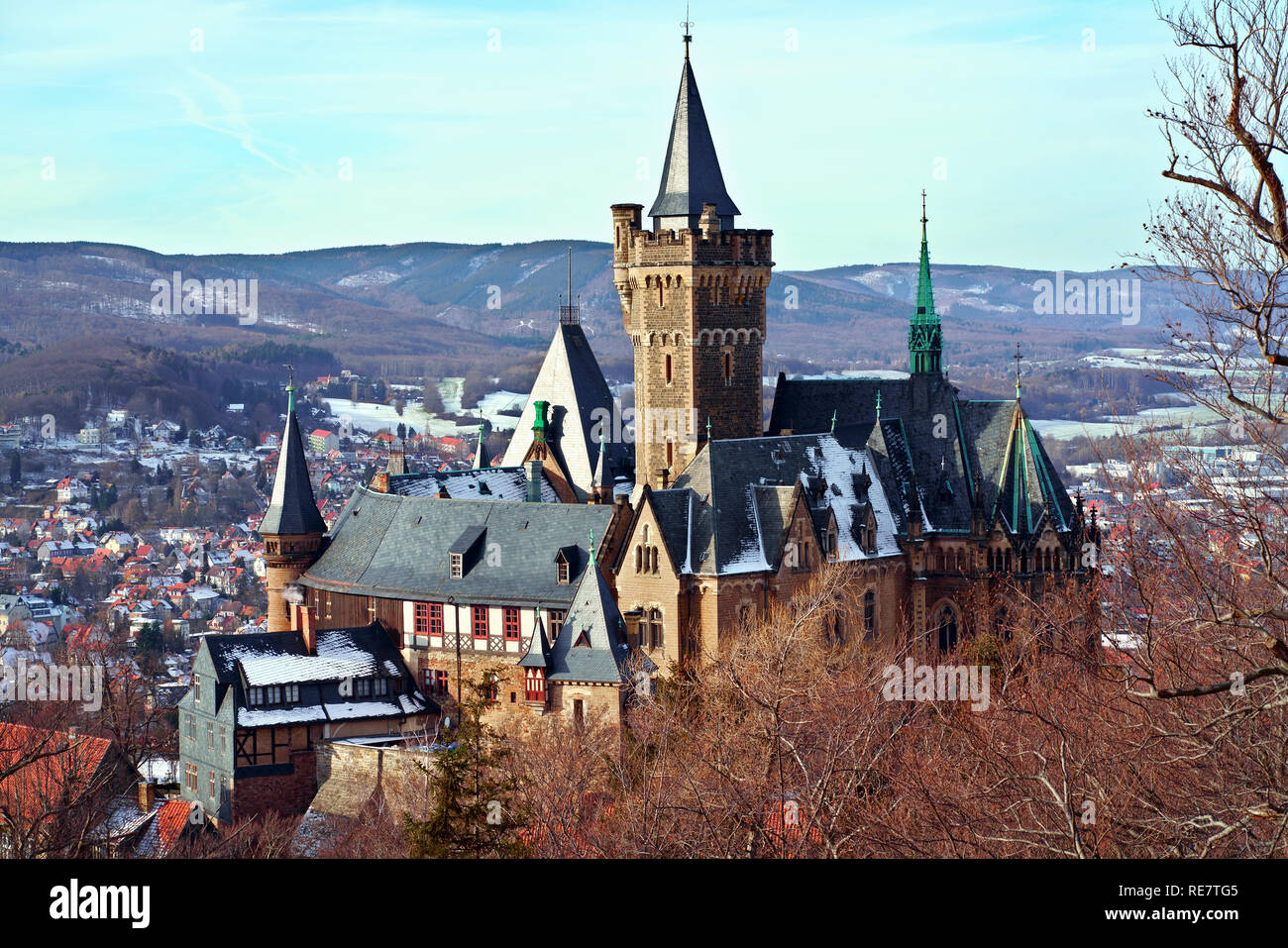 The picturesque castle of Wernigerode, high above town, in winter. Wernigerode in the Harz mountains, Saxony-Anhalt, central Germany. Stock Photo