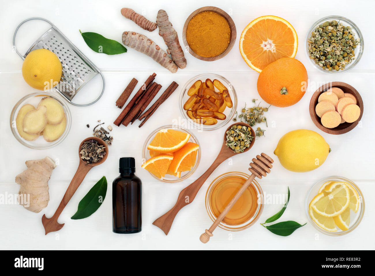Ingredients for cold and flu remedy with ginger, turmeric, echinacea, chamomile and cinnamon