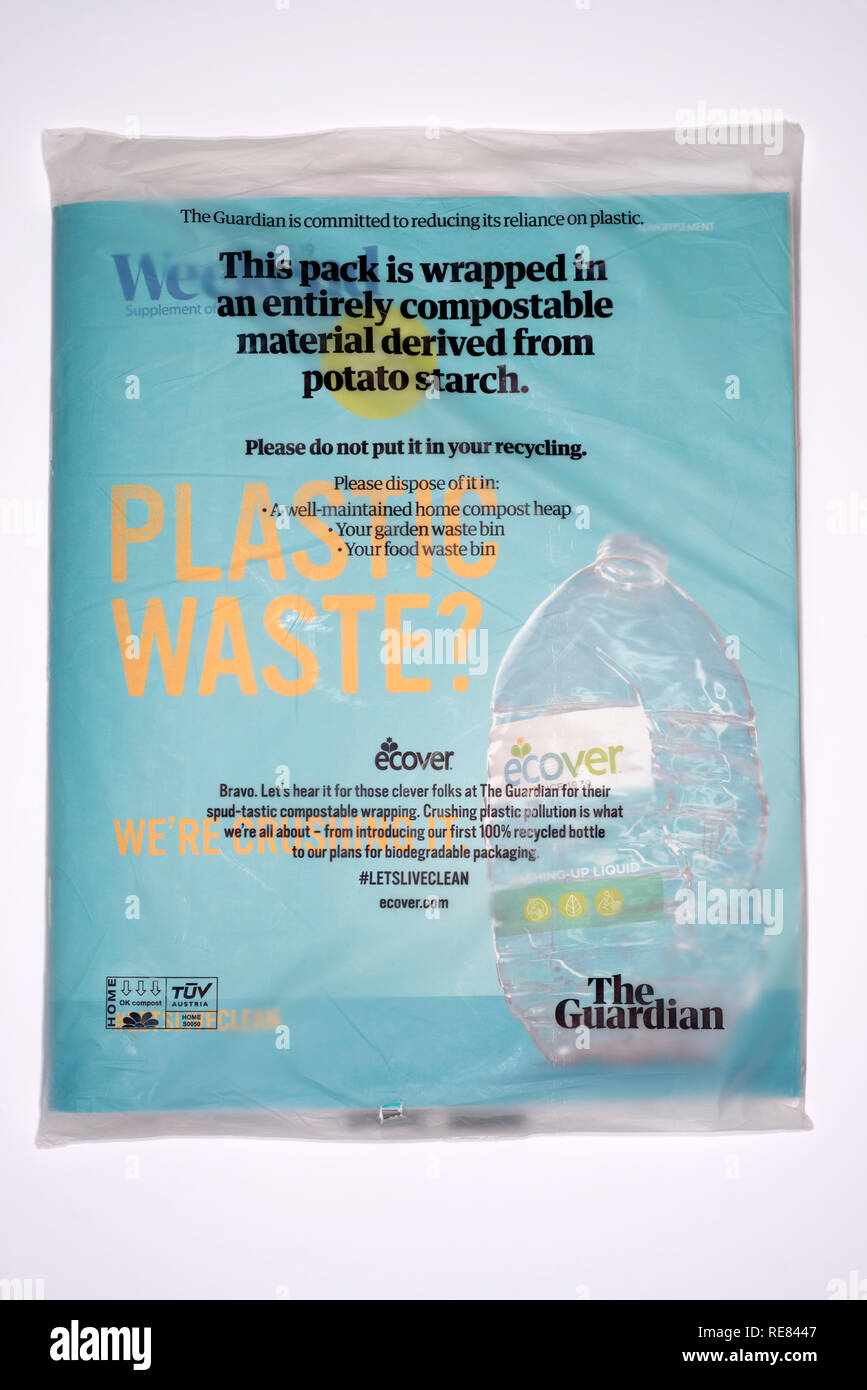 Guardian Weekend magazine wrapped in compostable material derived from potato starch Stock Photo