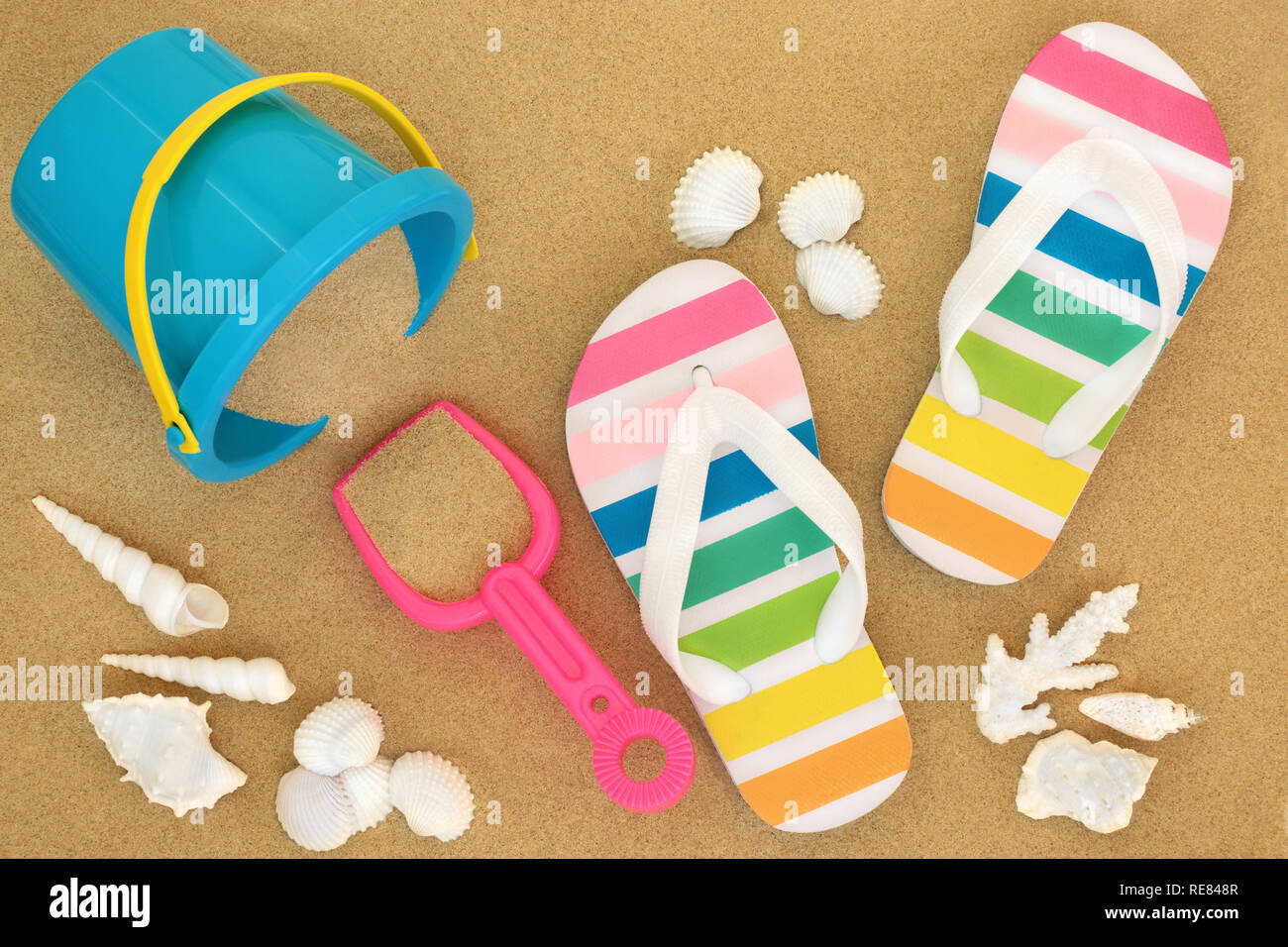 Simple Beach Slapper Summmer vacation at the beach concept with colourful flip flops ...