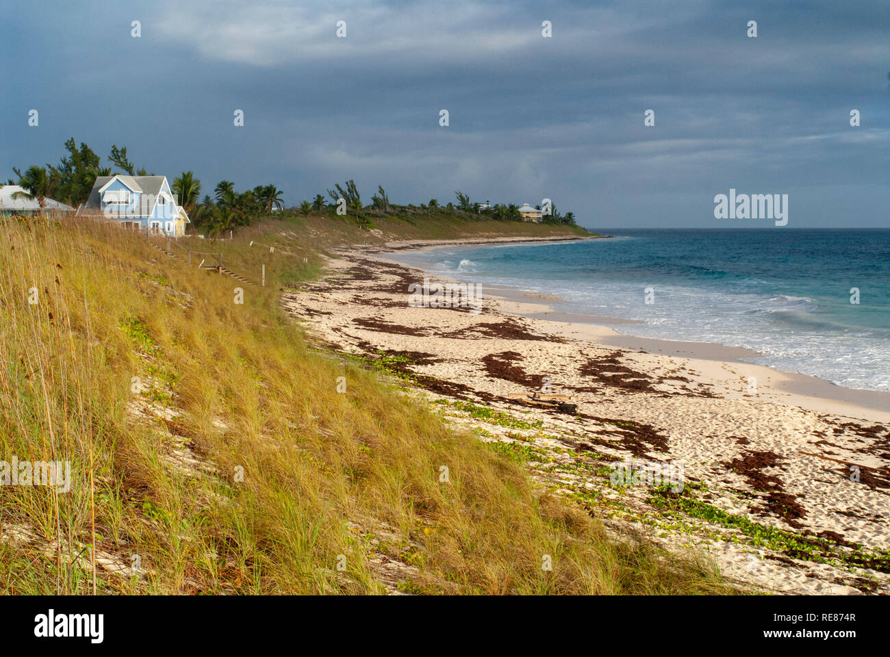Typical loyalist house next to the beach, Hope Town, Elbow Cay, Abacos. Bahamas Stock Photo