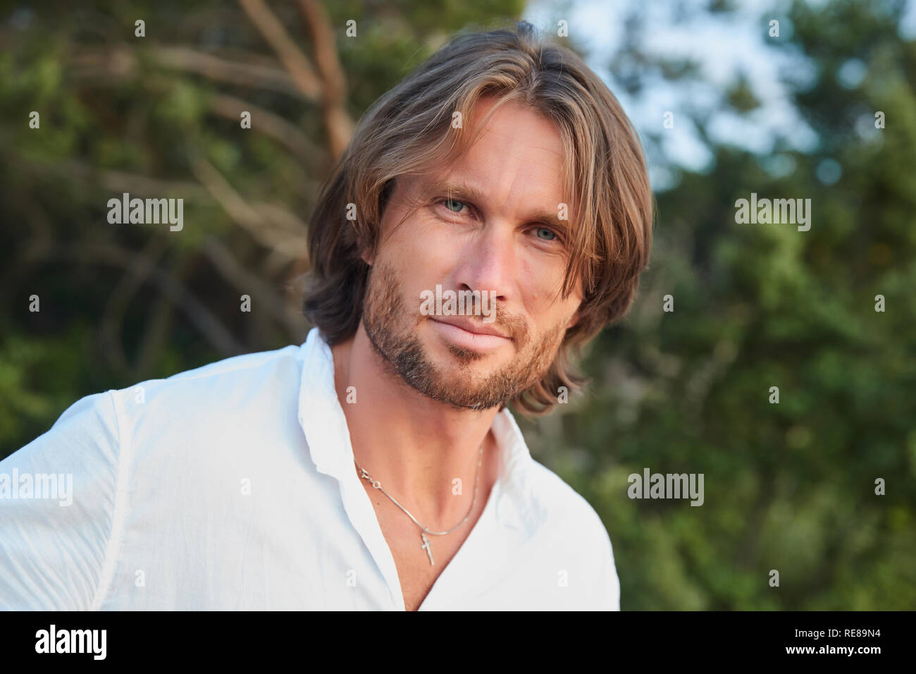 MILAN - JUNE 18: Man with blue eyes and black hair portrait before