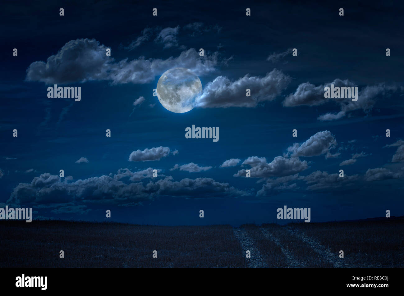 Moon and clouds in the night. Moonlight and road background. Dark blue