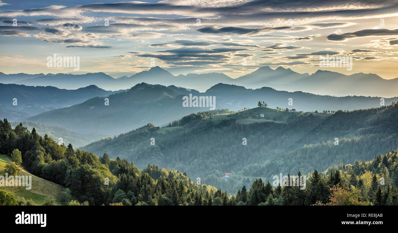 View towards St Thomas Church and the Kamnik Alps, Rantovse, Slovenia Stock Photo