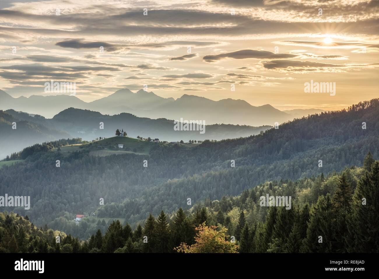 View towards St Thomas Church and the Kamnik Alps, Rantovse, Slovenia Stock Photo
