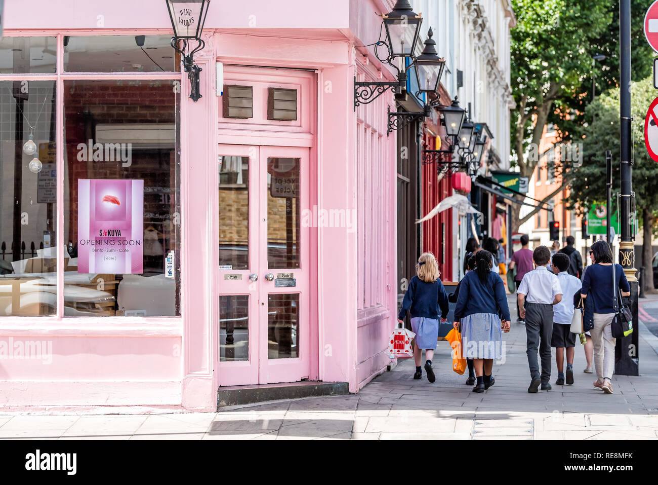 London, UK - June 21, 2018: Neighborhood district of Victoria or Pimlico with pink color vibrant colorful restaurant building for Sakuya Japanese food Stock Photo