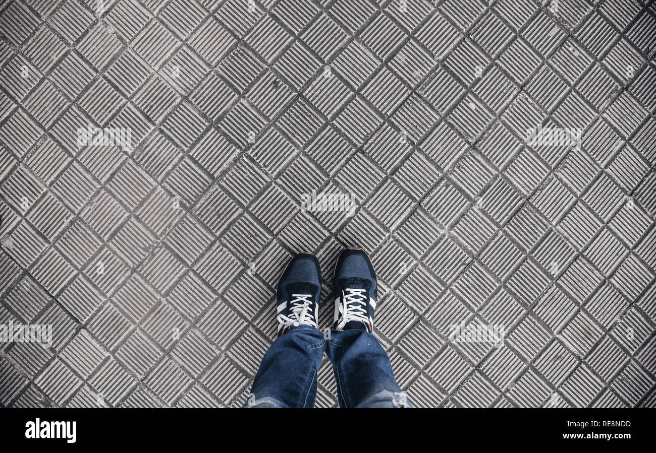 Feet with boots, urban fashion detail Stock Photo Alamy