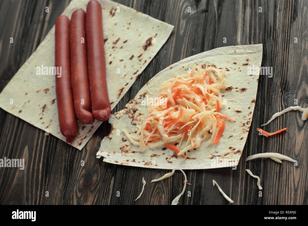 homemade sausage, pita bread and pickled cabbage for making Shawarma Stock Photo