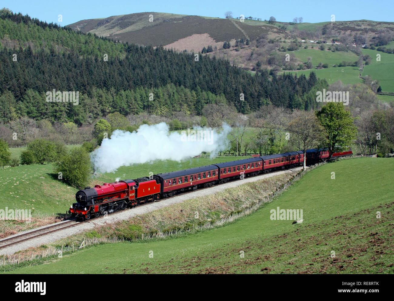 6100 Royal Scot heads past Garthydwr on the Llangollen Railway in LMS livery. Stock Photo