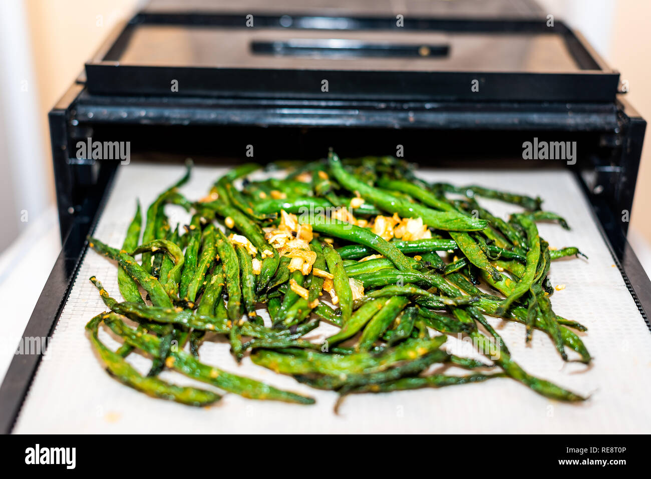 Dehydrator Black Tray Sheets With Dehydrated Vegetables Green Beans And Garlic Seasoning Raw Vegan Food Stock Photo Alamy