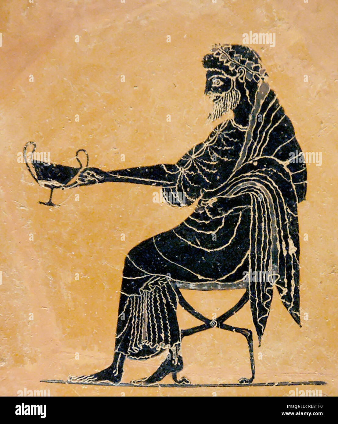 Dionysus extending a drinking cup Stock Photo