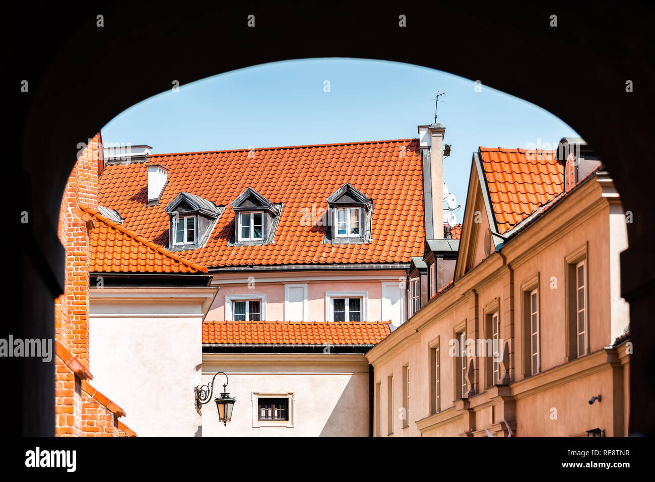 Warsaw, Poland street near old town market square with historic town architecture and window