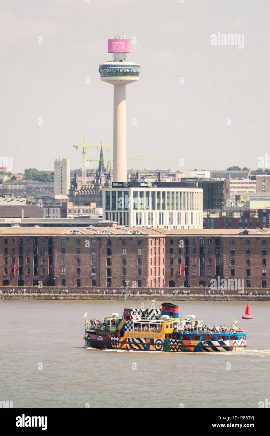 Ferry across the Mersey river showing Liverpool and St Johns tower Stock Photo