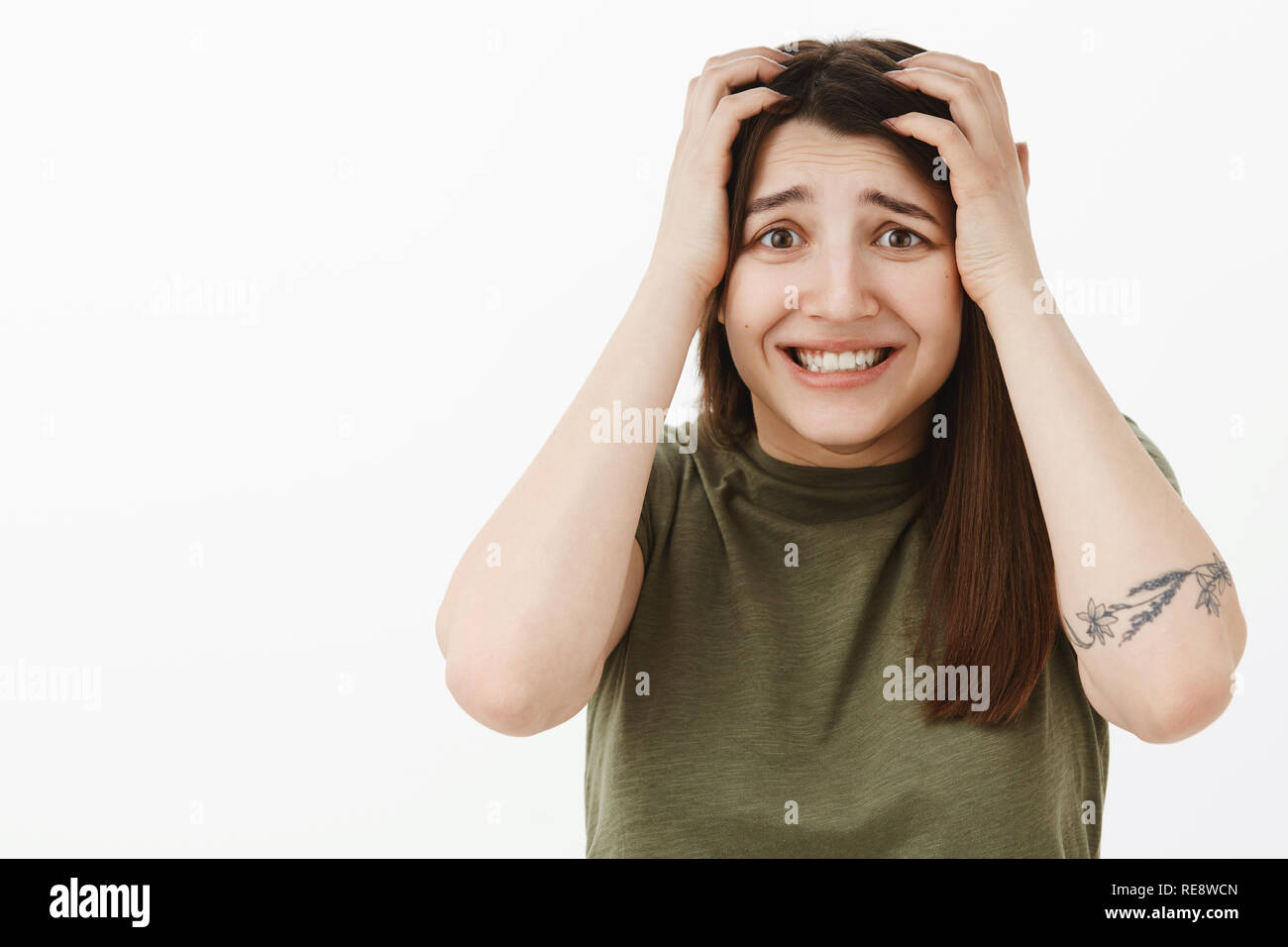 I am in trouble. Freakedout panicking young insecure woman going nuts