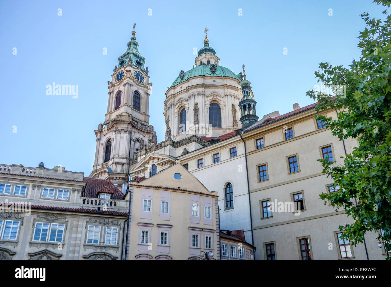 Towers of the St. Nicolas church in Prague Stock Photo