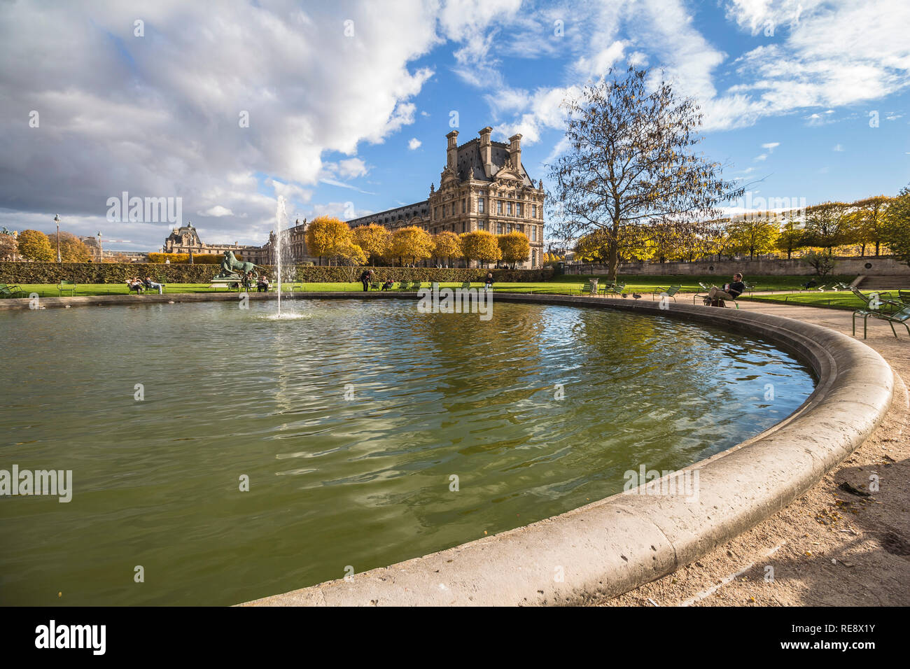 Beautiful park in Paris with water pool, Stock Photo