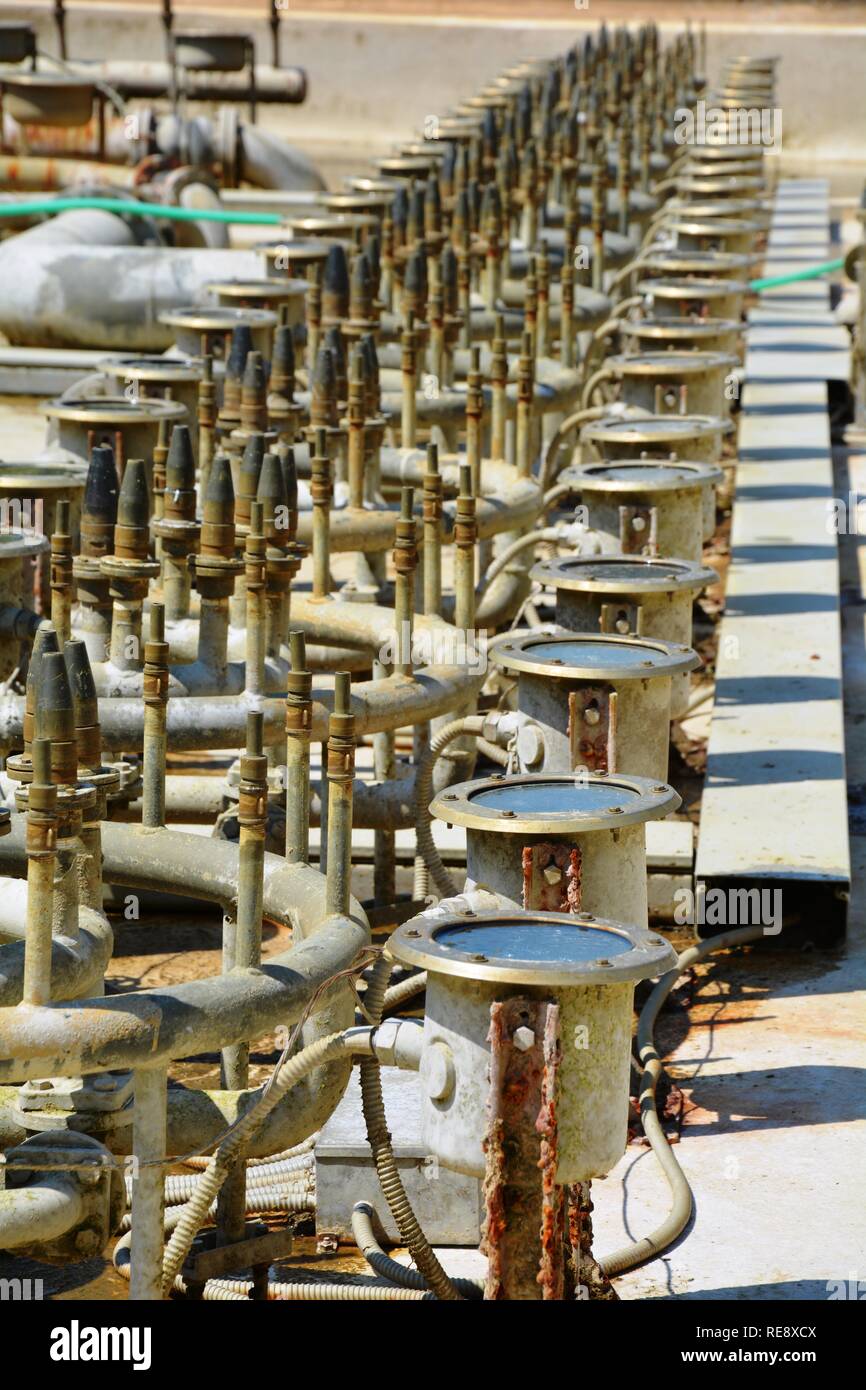 a dry fountain full of pipes and spotlights Stock Photo