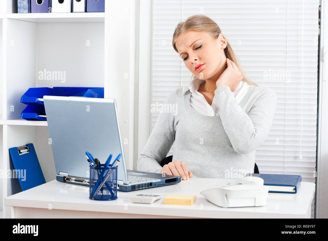 Neck Pain At Work Stock Photo 232537011 Alamy