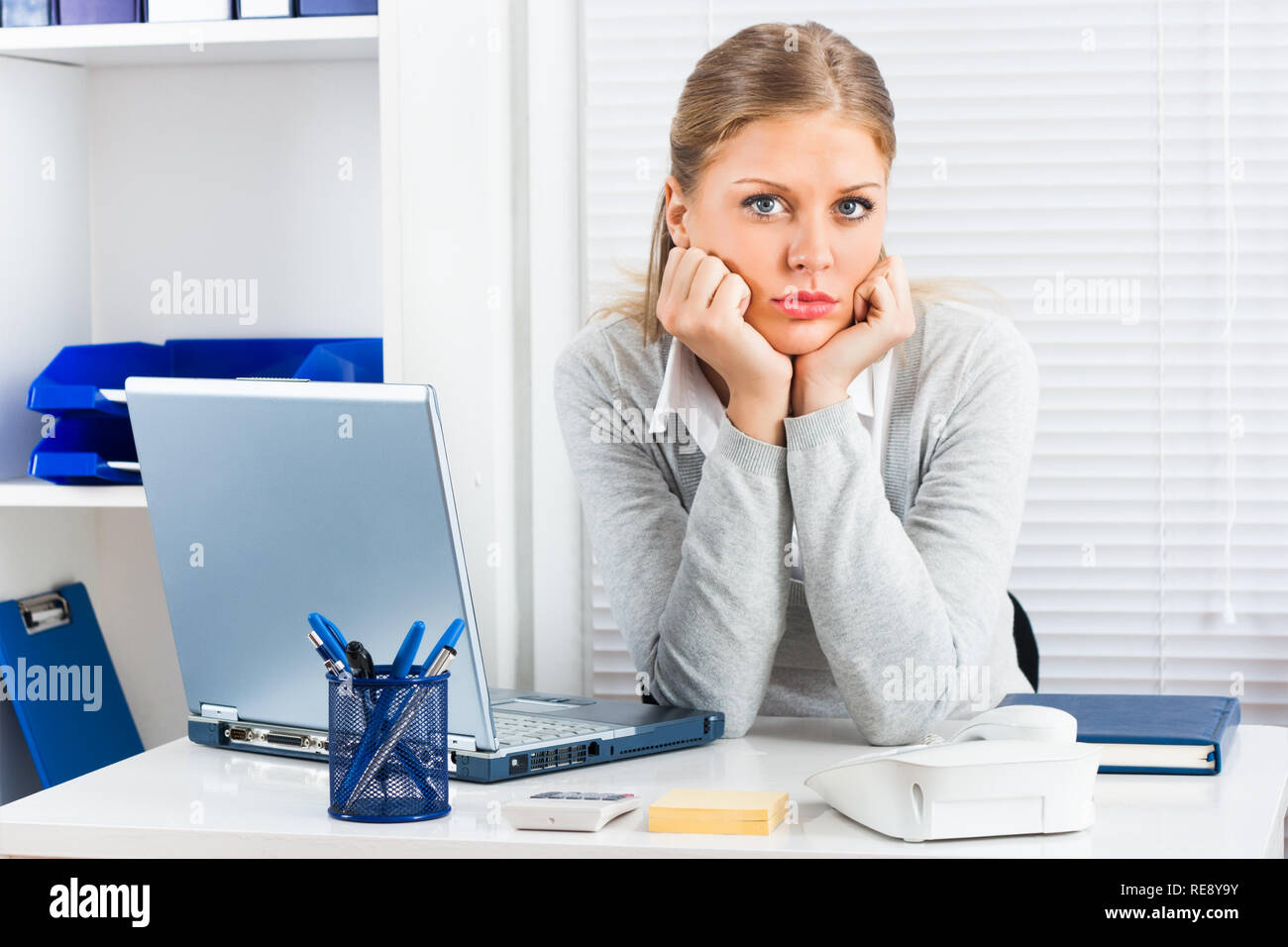 Tired businesswoman Stock Photo