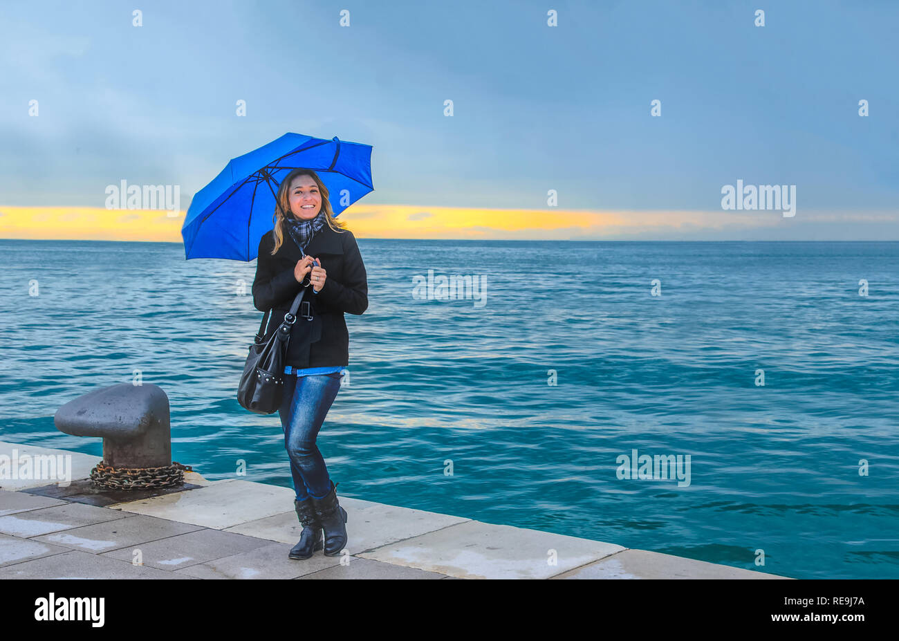 Woman and stormy sea hi-res stock photography and images - Alamy