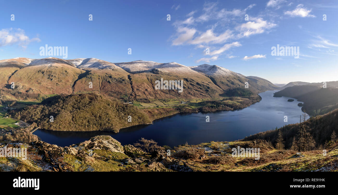 Stunning view down the entire length of Thirlmere from Raven Crag with the snow-topped Helvellyn and the Dodds behind Stock Photo
