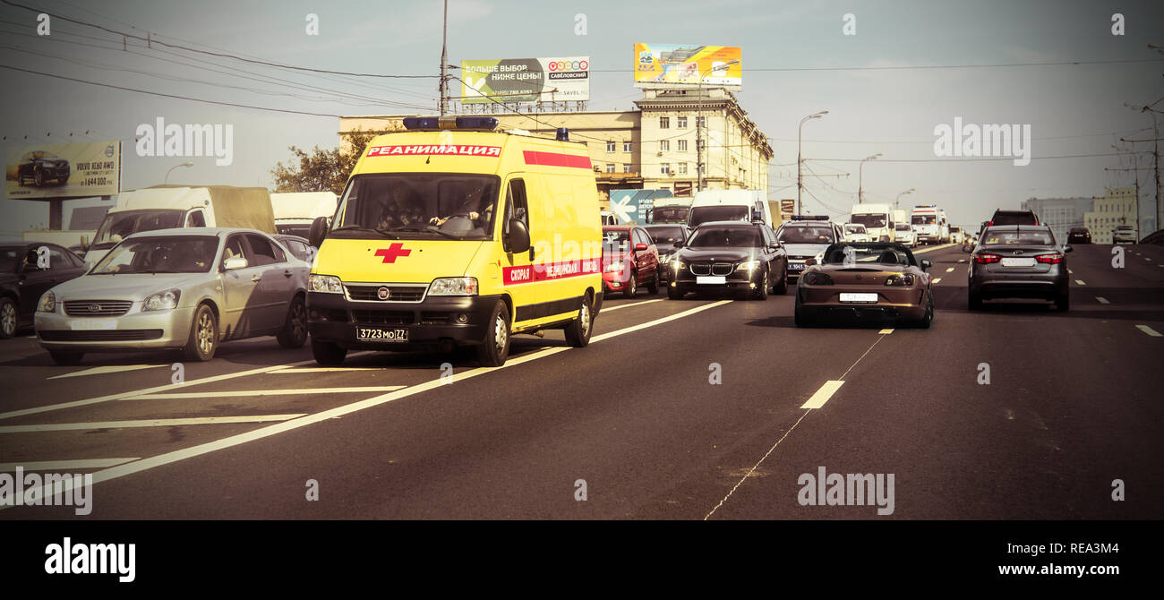 Moscow, Russia, 2012: ambulance van rushes on the opposite road lane Stock Photo