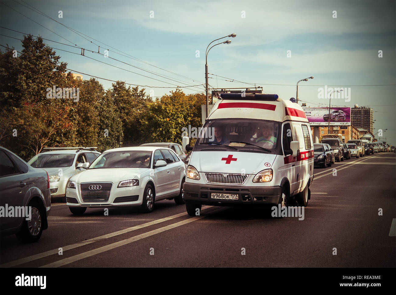 Moscow, Russia, 2012: ambulance van rushes on the opposite road lane Stock Photo