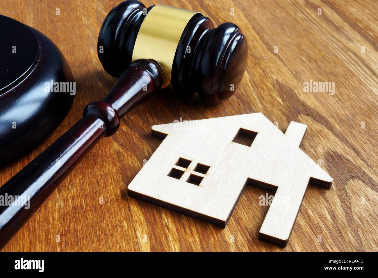 Real estate and property law. House model and gavel. Stock Photo