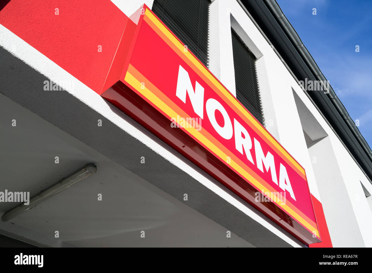 Norma sign at branch. Norma is a food discount store with more than 1,300 stores in Germany, Austria, France and the Czech Republic. Stock Photo