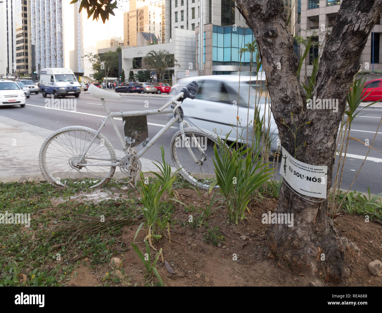 Ghost bike, bicycle painted white as form of roadside memorial, placed where a cyclist has been killed or severely injured, Sao Paulo, Brazil Stock Photo