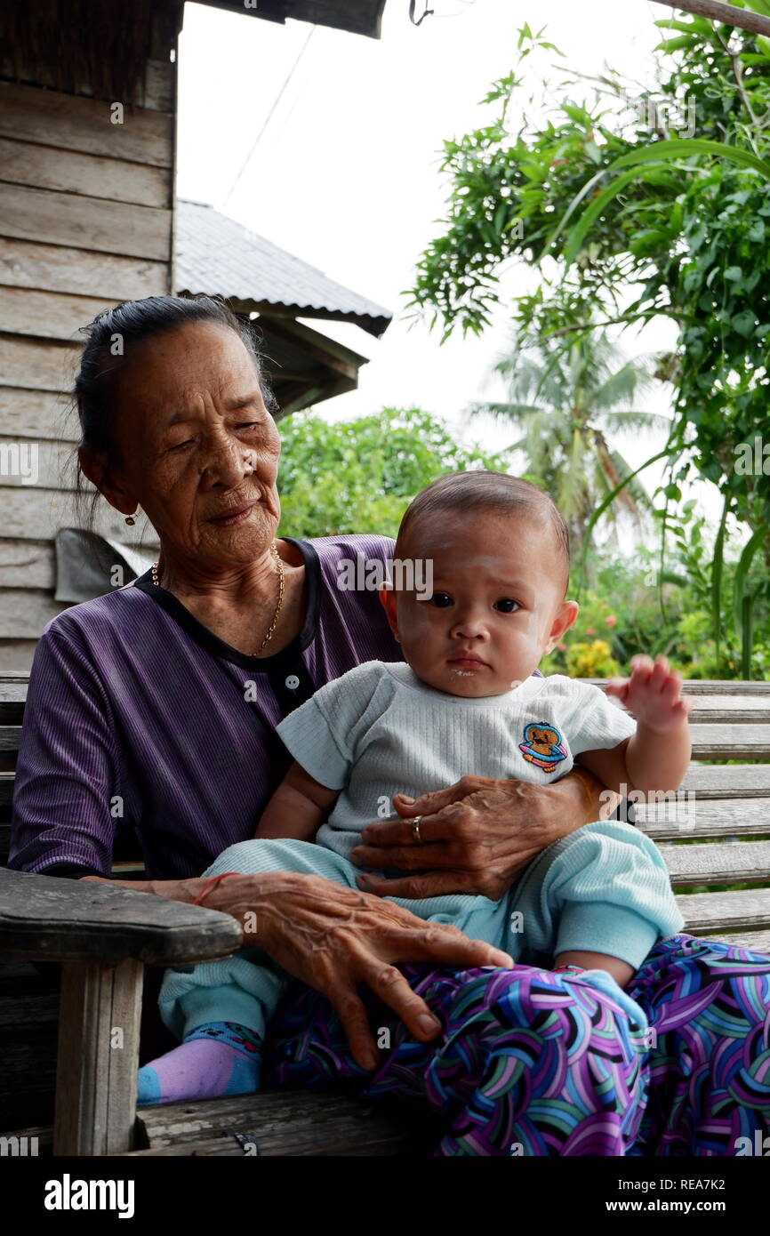 indonesian great grandma and great grandson Stock Photo