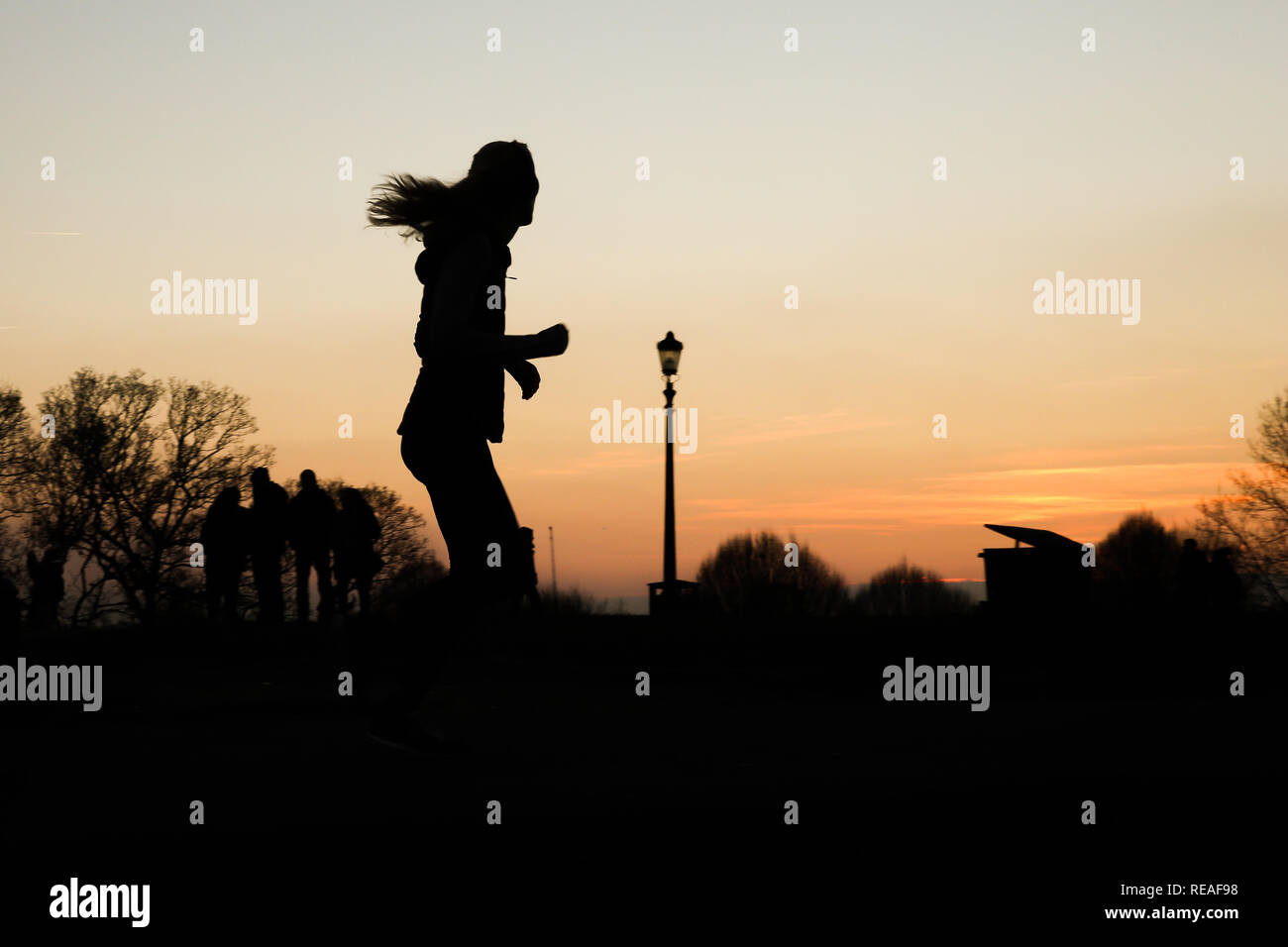 London, UK. 20th Jan, 2019. A jogger is seen at the Primrose Hill during a golden winter sunset after a cold and sunny day in the capital. Credit: Dinendra Haria/SOPA Images/ZUMA Wire/Alamy Live News Stock Photo