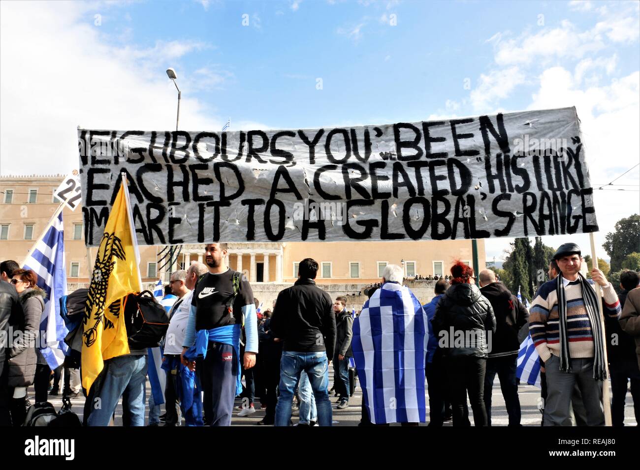 Demonstrators Seen Next To A Huge Banner During The Protest